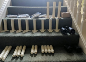 An image of an unassembled stair lift