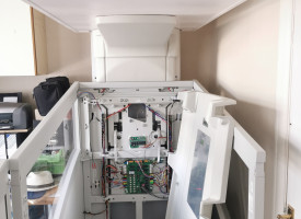 An image of an unassembled accessibility elevator in a home or business